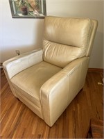 Cream colored leather pushback recliner