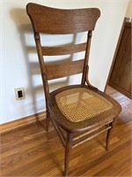 Antique chair with wicker seat