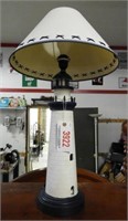 Lot #3922 - Lighthouse themed table lamp 28”