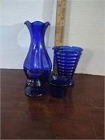 Group of cobalt blue vases and candle holders