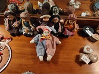 Group of small porcelain dolls, court jester doll