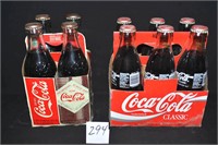 2 cases of Coca-Cola bottles 1 case has four 75th