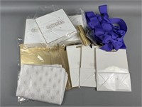 Collection of Chanel Bags Boxes and Ribbons