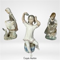 This enchanting group of three Lladro porcelain f.