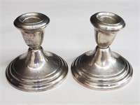 Pair of sterling weighted candle holders