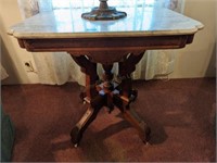 Ornate Oak Marble-topped Table on Casters