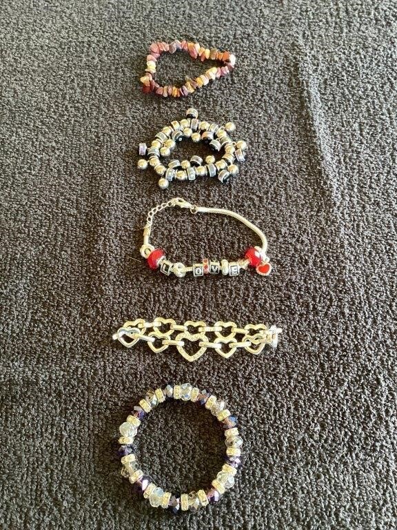 G) lot of five beautiful bracelets