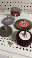 Grinding wheels and brushes