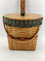Longaberger basket with handle and lid.