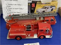 TWO PLASTIC FIRE TRUCKS