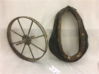 Iron wagon wheel and horse collar
