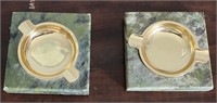 Brass ashtrays inlaid in marble