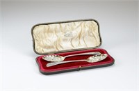 Pair of George III English silver berry spoons