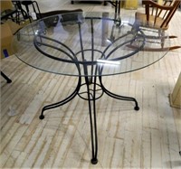 Glass Top Garden Table with Iron Base.