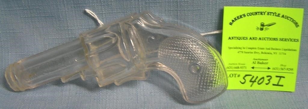 Early glass hand gun candy container