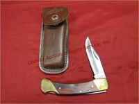 1 Uncle Henry pocket knife w/ leather sheath