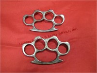 2 brass knuckles (gray?)