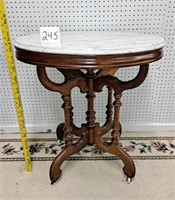 oval marble top parlor table  30x27