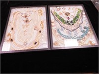 Two containers of faux pearl jewelry including