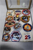 Thirteen NASA mission patches