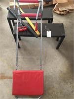 2 plastic side tables, exercise machine, 2