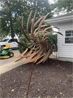 Metal whirligig yard ornament