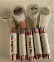 Nine rolls of uncirculated pennies including