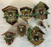 Grouping of black forest miniature cuckoo clocks