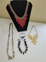 3 modern necklaces and a bracelet