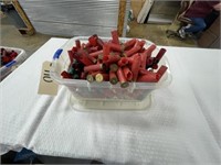 Tub of Spent Shotgun Shells for Reloading