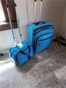 Set of blue American tourist  soft side luggage
