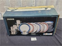 Trend Unused dish set with plates, mugs, bowls