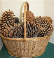 WICKER BASKET FULL OF MULTI SIZE PINE CONES