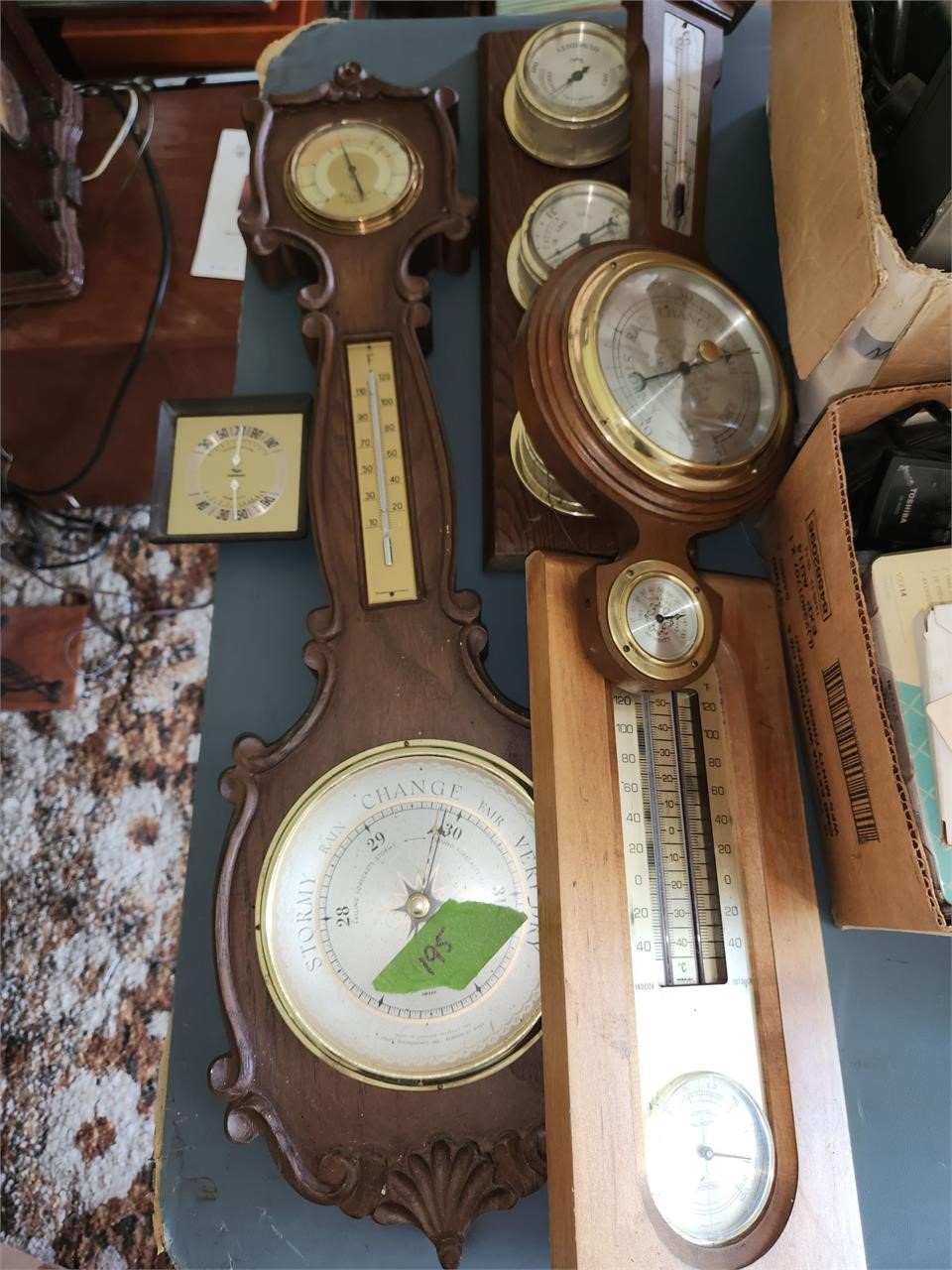 Barometers, thermometers