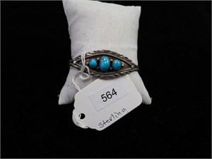 Sterling cuff bracelet with  three turquoise