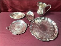 Various Serving Pieces Of Silver Plate