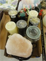 assorted candles, jar, salt lamp