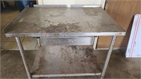 Stainless steel work bench with drawer.