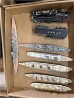 Vintage metal and plastic war ships and train