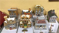 Seven Christmas display houses with the boxes