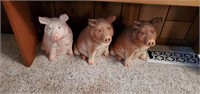 Resin pig statues (3)