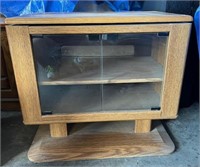 TV Stand with Glass Front and Swivel Top