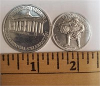 (1) Commemorative Coin (1) Game Piece