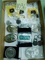 Flat Of Expo Keychains, Belt Buckles, Paperweights