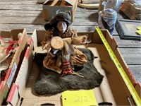 Native American seated brave doll
