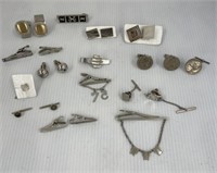 Assorted tie tacks and cuff links