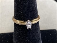 14k yellow oval diamond ring.
