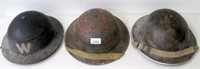 Three WW11 metal military helmets