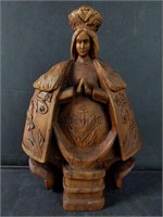 Carved wood religious santo