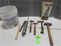Grease gun, hammers; hatchet; mole trap; plastic b
